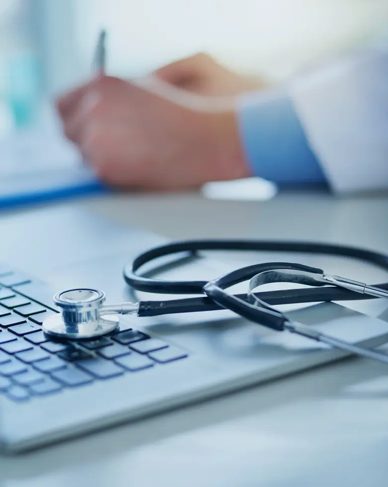 Medical stethoscope on light doctors table in clinic healthcare